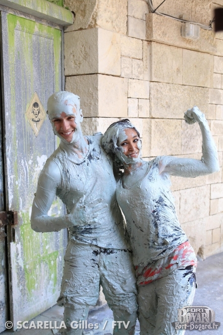 Cyril et Aïda à la sortie de l'épreuve de la Lutte dans la boue(2013)